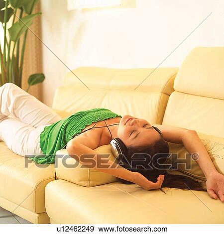 Young Adult, Joy, Entertainment, Home Interior, One Person View Large Photo Image Stock Photo - Young Adult, Joy, Entertainment, Home Interior, One Person. Fotosearch