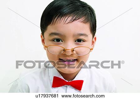 Stock Image - Child, Asian Ethnicity, Casual Clothing, Bow Tie, Black Hair, Clipping Path, 4-5 Years. Fotosearch