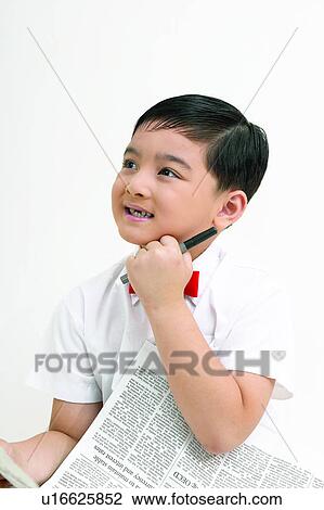 Stock Image - Childhood, Smiling, Indoor, Bow Tie, Clipping Path, One Child Only. Fotosearch
