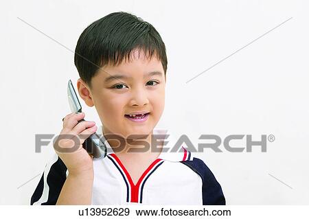 Stock Photo - Clipping Path, Asian Ethnicity, Child, Casual Clothing, Black Hair, Close-Up, 4-5 Years. Fotosearch