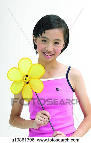 Close-Up, Childhood, Looking At Camera, Fragility, One Person, Casual Clothing View Large Photo Image Stock Photograph - Close-Up, Childhood, Looking At Camera, Fragility, One Person, Casual Clothing. Fotosearch