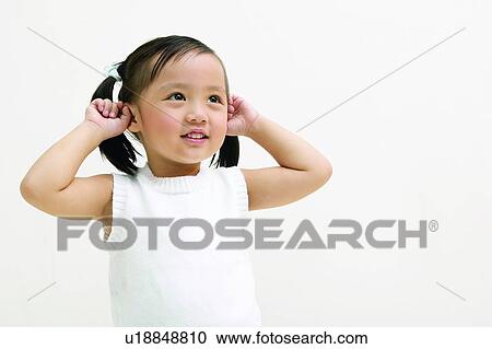 Stock Image - Indoor, Black Hair, One Child Only, Clipping Path, Child, Looking Away. Fotosearch