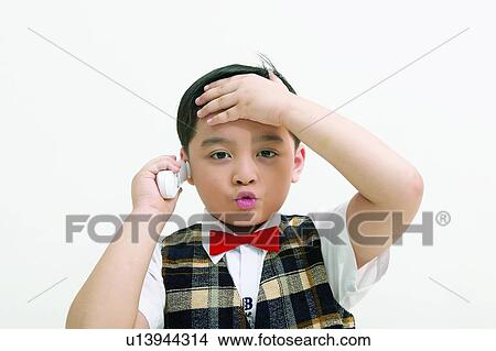 Indoor, Head In Hands, One Person, White Background, One Child Only View Large Photo Image Picture - Indoor, Head In Hands, One Person, White Background, One Child Only. Fotosearch