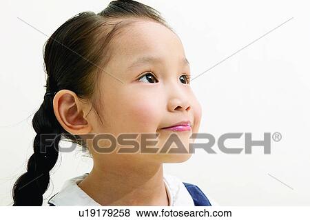 Stock Photo - Kids Stuff, Casual Clothing, Clipping Path, One Person, Smirking, Indoor. Fotosearch