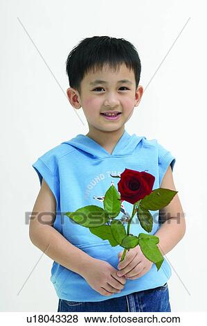 Stock Photo - Rose, Jeans, Happiness, Black Hair, Child. Fotosearch