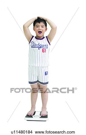 Picture - Child, Asian Ethnicity, Casual Clothing, Black Hair, Barefoot, Clipping Path, 6-7 Years. Fotosearch