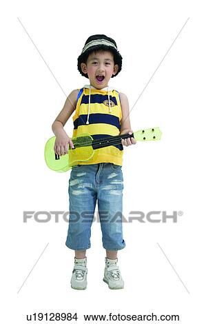 Entertainment, Childhood, Rolled Up Pants, Innocence, Toothy Smile, Guitar View Large Photo Image Picture - Entertainment, Childhood, Rolled Up Pants, Innocence, Toothy Smile, Guitar. Fotosearch