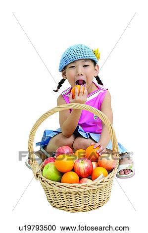 Innocence, Healthy Eating, Fruit, Asian Ethnicity, Casual Clothing View Large Photo Image Stock Image - Innocence, Healthy Eating, Fruit, Asian Ethnicity, Casual Clothing. Fotosearch