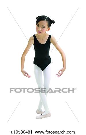Stock Image - Performing Arts Event, Legs Crossed At Knee, White Background, Practicing, Pigtails, One Child Only. Fotosearch