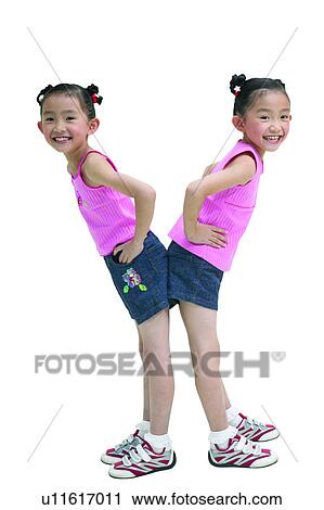 Stock Image - Smiling, Back To Back, Pigtails, Joy, Black Hair, Fun. Fotosearch