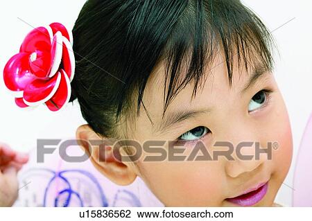 Stock Image - Clipping Path, Artificial Wing, Child, Black Hair, Asian Ethnicity, Close-Up, 2-3 Years. Fotosearch