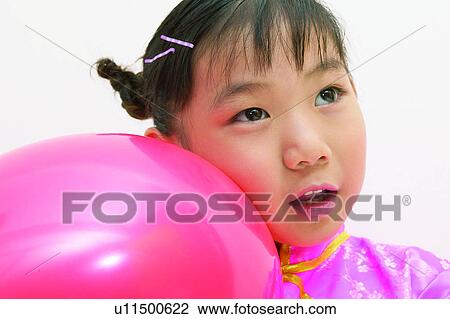 Stock Image - Close-Up, Clipping Path, Looking Away, Cute, Asian Ethnicity, Imagination, Traditional Clothing. Fotosearch
