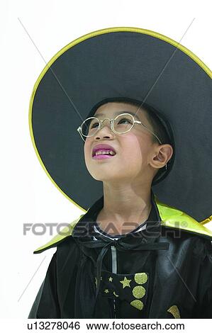 Enjoyment, Eyeglasses, Hat, One Child Only, One Person, Serious, Head And Shoulders View Large Photo Image Stock Photograph - Enjoyment, Eyeglasses, Hat, One Child Only, One Person, Serious, Head And Shoulders. Fotosearch