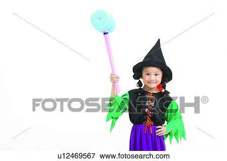 Stock Photo - Holding, Cut Out, Witch, White Background, Childhood. Fotosearch