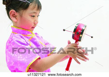 Stock Image - Imagination, Close-Up, Kids Style, Indoor, One Child Only, Traditional Clothing. Fotosearch