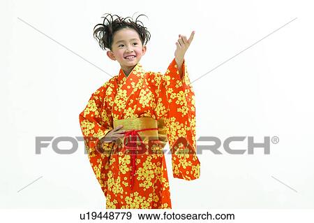 Stock Photo - Kids Style, Cut Out, Toothy Smile, Kimono, Hand On Hip, Black Hair, Asian. Fotosearch