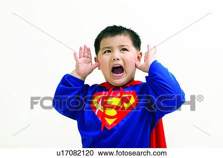 Stock Image - One Boy Only, Enjoyment, Superhero, Making A Face, Indoor, Heroes, Shouting. Fotosearch
