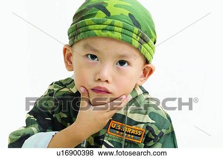 Stock Photo - Thinking, Military, Indoor, Looking At Camera, One Person. Fotosearch