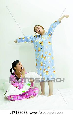Braids, Hand Over Mouth, Sitting, Pillow, Morning View Large Photo Image Stock Image - Braids, Hand Over Mouth, Sitting, Pillow, Morning. Fotosearch