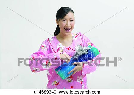 Stock Image - Content, Toothy Smile, Life Events, Close-Up, Girl. Fotosearch