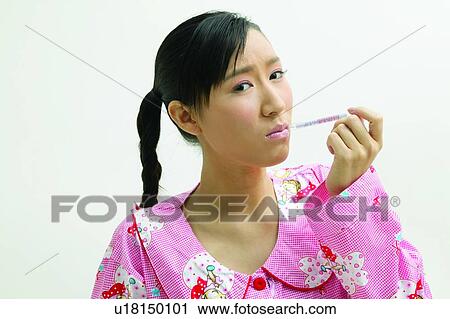 Stock Image - Examining, Pensive, Braids, Portrait, Indoor. Fotosearch