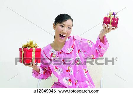 Stock Photography - Happiness, Asian Ethnicity, Portrait, Black Hair, Content. Fotosearch