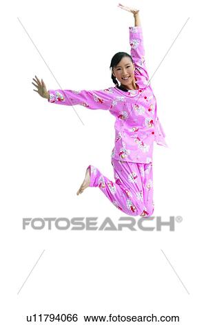 Stock Photograph - Nightwear, Long Hair, Energy, Arm Outstretched, Indoor. Fotosearch