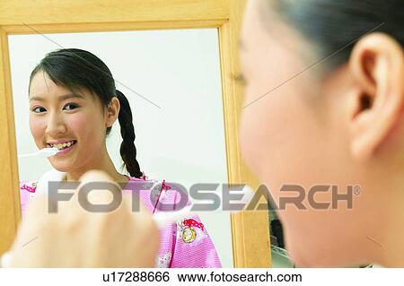 Stock Photograph - Nightwear, Morning, Happiness, Asian Ethnicity, Young Adult. Fotosearch