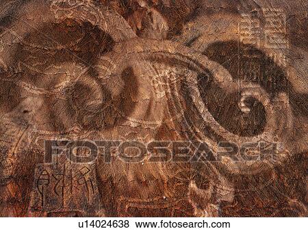 Oriental text superimposed on ancient wall art View Large Photo Image Stock Photo - Oriental text superimposed on ancient wall art. Fotosearch