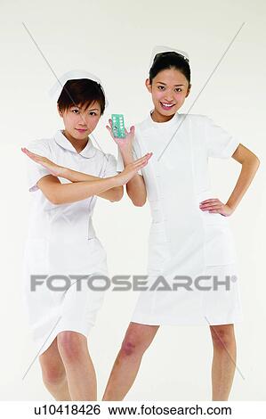 Asian Ethnicity, Cheerful, Brown Hair, Black Hair, Adults Only View Large Photo Image Stock Photograph - Asian Ethnicity, Cheerful, Brown Hair, Black Hair, Adults Only. Fotosearch
