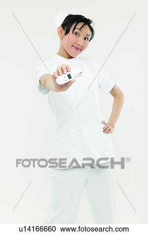 Stock Image - Black Hair, Digital Thermometer, Cut Out, Asian Ethnicity. Fotosearch