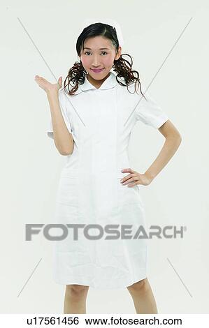 Stock Photograph - Black Hair, Female Nurse, Cut Out, Asian Ethnicity. Fotosearch
