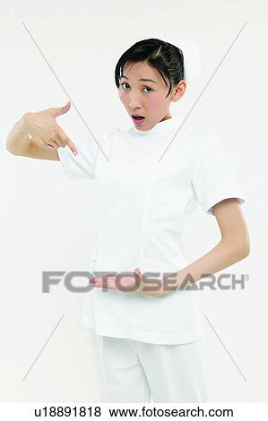 Black Hair, Waist-Up, Indoor, Cut Out, Uniform, Gesturing, Nurse View Large Photo Image Stock Photo - Black Hair, Waist-Up, Indoor, Cut Out, Uniform, Gesturing, Nurse. Fotosearch