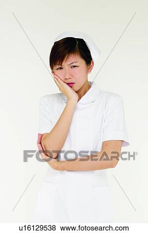 Brown Hair, Facial Expression, Cut Out, Asian Ethnicity View Large Photo Image Stock Photo - Brown Hair, Facial Expression, Cut Out, Asian Ethnicity. Fotosearch