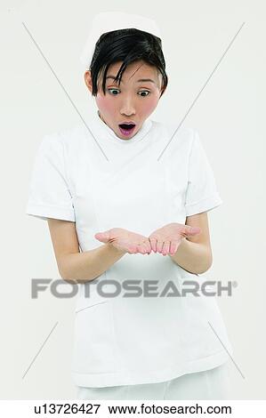 Cut Out, Standing, Uniform, Shock, Medical Occupation, Female Nurse View Large Photo Image Stock Photo - Cut Out, Standing, Uniform, Shock, Medical Occupation, Female Nurse. Fotosearch