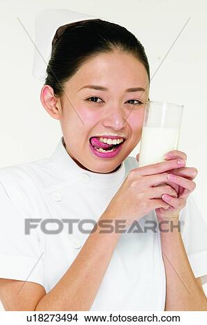 Picture - Healthy Eating, Glass, Healthy Lifestyle, Indoor, Portrait, Black Hair. Fotosearch