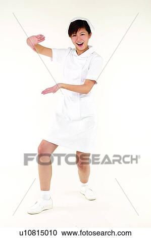 Stock Image - Indoor, Brown Hair, Posing, Uniform, Happiness, Skill. Fotosearch
