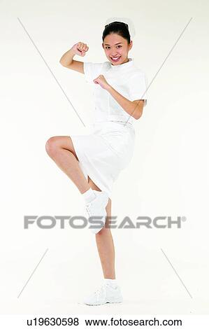 Kicking, Cheerful, Asian Ethnicity, Skill View Large Photo Image Stock Photo - Kicking, Cheerful, Asian Ethnicity, Skill. Fotosearch