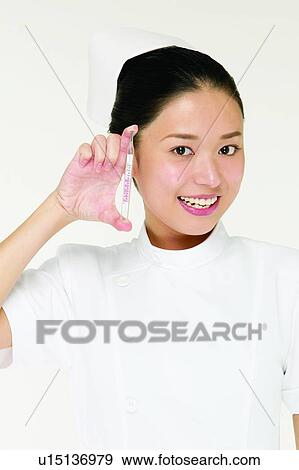 Nurse, Portrait, Indoor, One Young Woman Only, Hair Back, Young Adult View Large Photo Image Stock Photo - Nurse, Portrait, Indoor, One Young Woman Only, Hair Back, Young Adult. Fotosearch