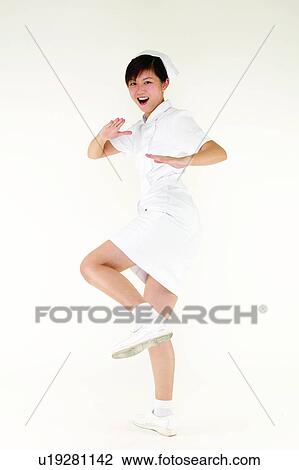 Stock Image - Portrait, Happiness, White, Female Nurse, Skill, Looking At Camera. Fotosearch