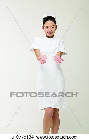 Picture - Showing, Cut Out, Female Nurse, Looking At Camera, Medical Occupation, Skill. Fotosearch