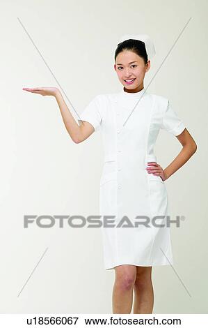 Skill, White Background, Cheerful, Indoor, Nurse View Large Photo Image Stock Photo - Skill, White Background, Cheerful, Indoor, Nurse. Fotosearch