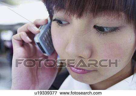 Bangs, Close-Up, Businesswoman, Brown Hair, Asian Ethnicity View Large Photo Image Stock Photo - Bangs, Close-Up, Businesswoman, Brown Hair, Asian Ethnicity. Fotosearch