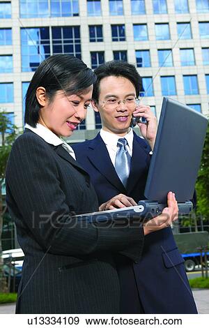 Stock Photo - Building Exterior, Day, Laptop, Adults Only, Lady. Fotosearch