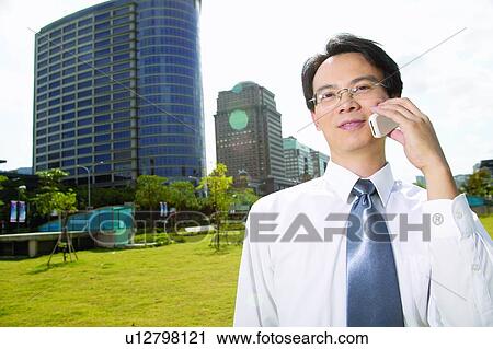 Business, Cloud, One Person, Connection, Formal Clothing, Mobility View Large Photo Image Stock Image - Business, Cloud, One Person, Connection, Formal Clothing, Mobility. Fotosearch
