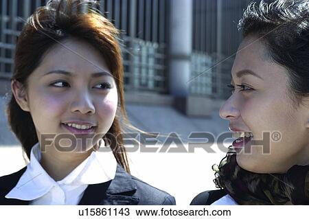 Stock Image - Business Suit, Business, Adults Only, Close-Up, Standing, Long Hair. Fotosearch