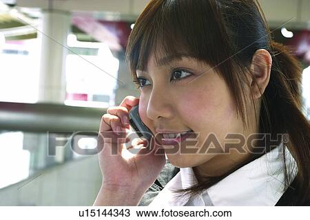 Close-Up, Bangs, Cheerful, Businesswoman, Brown Hair, Asian Ethnicity View Large Photo Image Stock Image - Close-Up, Bangs, Cheerful, Businesswoman, Brown Hair, Asian Ethnicity. Fotosearch