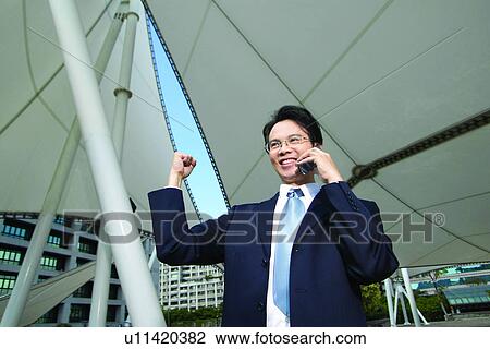 Stock Image - Communication, Building Structure, Office Lady, Building Exterior, Technology. Fotosearch