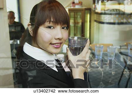 Stock Image - Day, Drink, Chair, Indoor, Office, Formal Clothing. Fotosearch