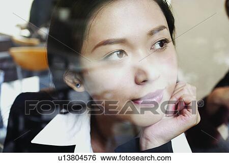 Stock Photograph - Formal Clothing, Focus On Foreground, Small Business, Indoor, Young Adult, Day. Fotosearch